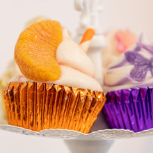 Load image into Gallery viewer, A few cupcake shaped soaps.
